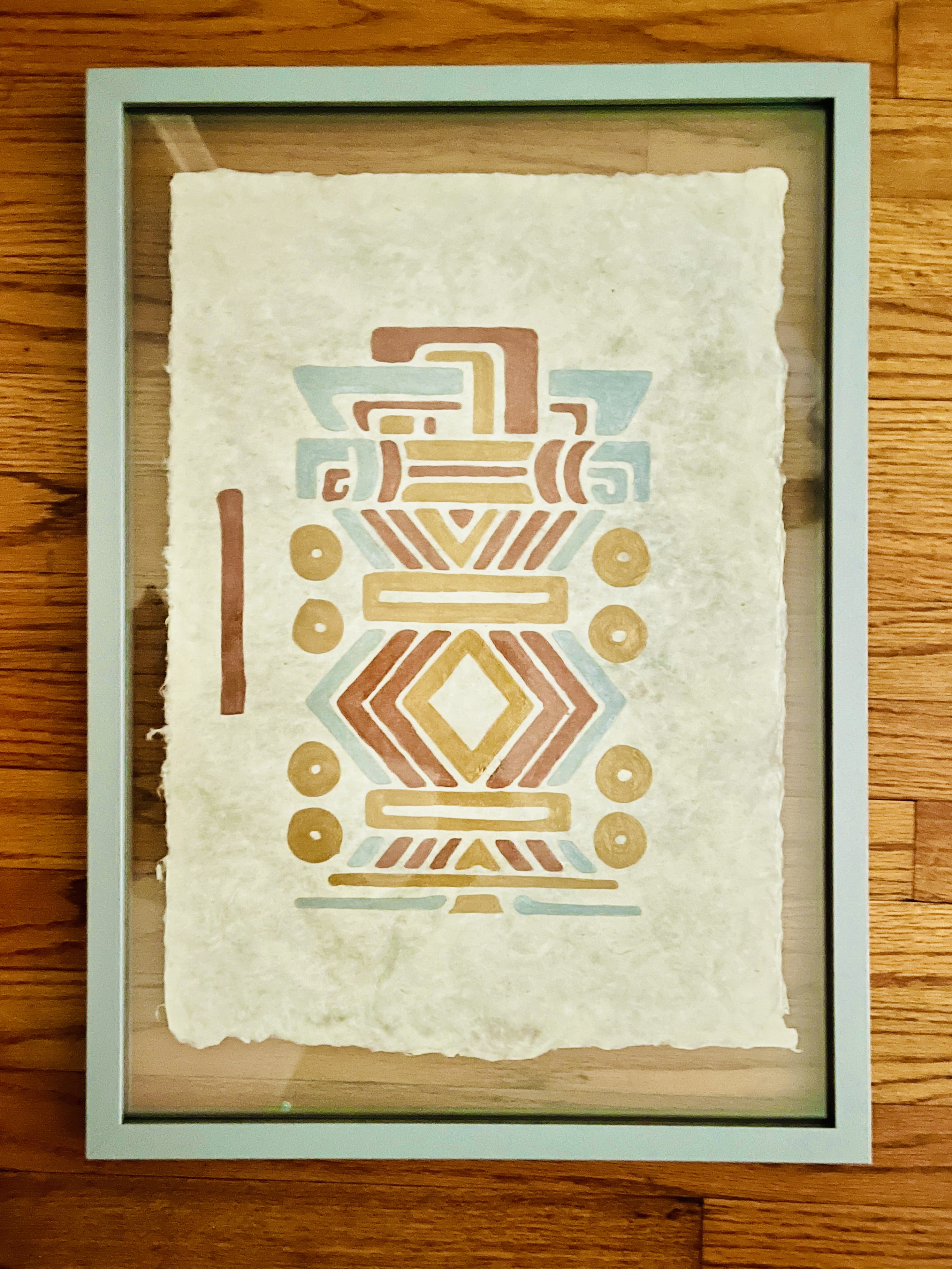 The Kukulkán in glass frame