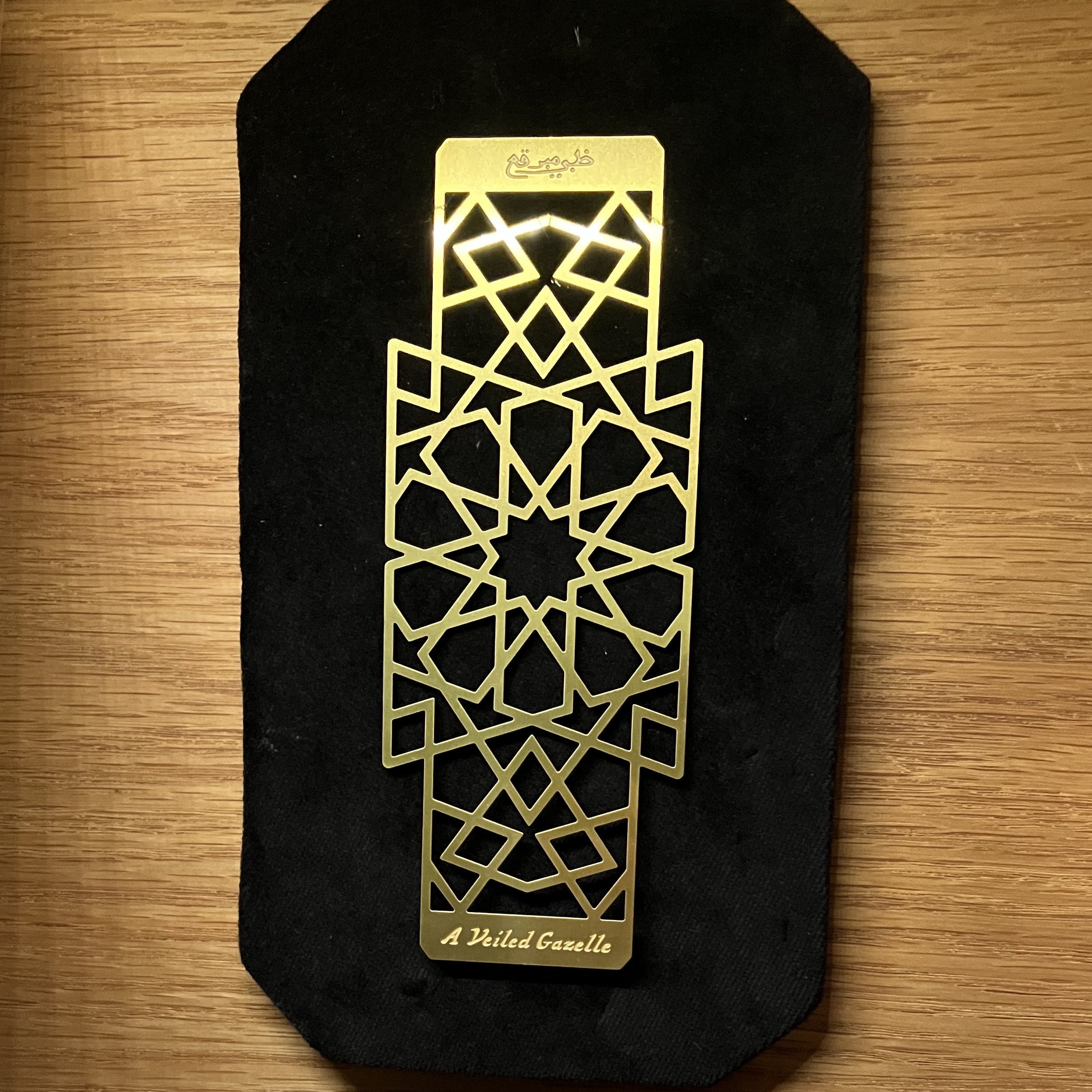 Veiled Gazelle bookmark with custom Arabic calligraphy